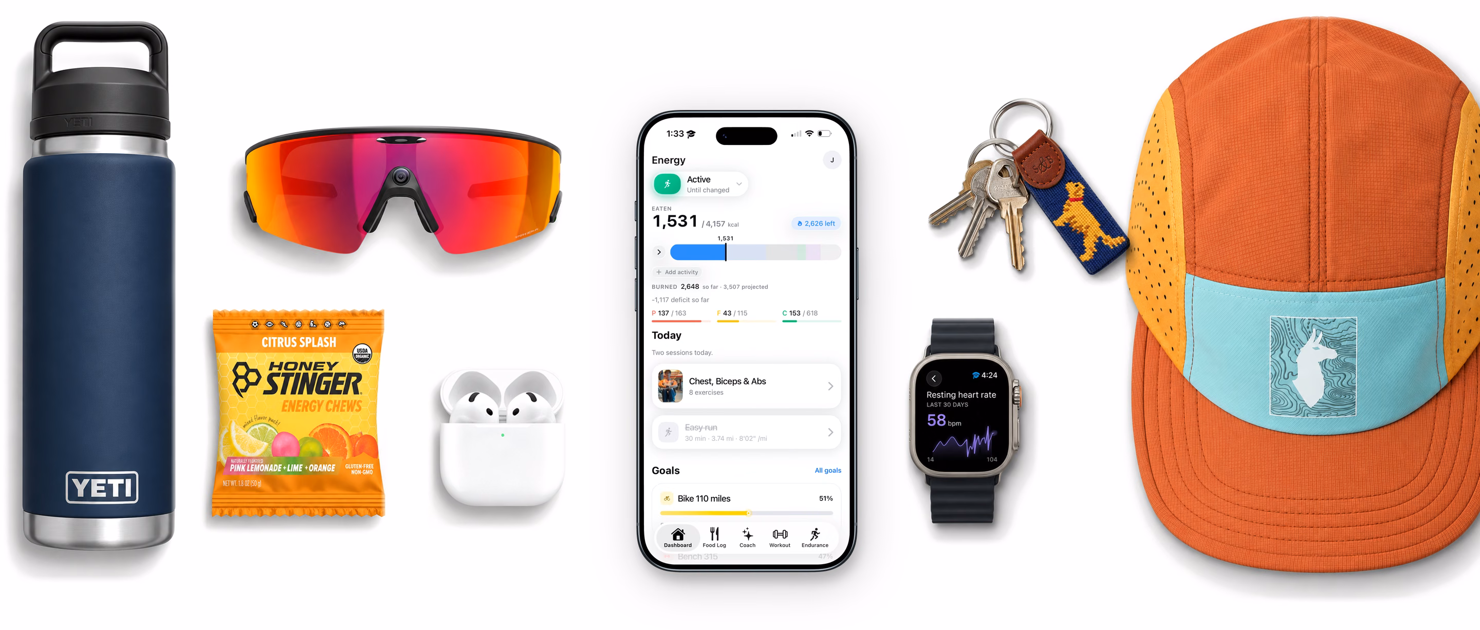 A flat lay of training essentials: a navy YETI bottle, red-lens sport sunglasses, a Honey Stinger energy chews packet, white wireless earbuds in their case, an iPhone showing the Base dashboard, an Apple Watch showing resting heart rate, a keyring with a needlepoint fob, and an orange running cap.